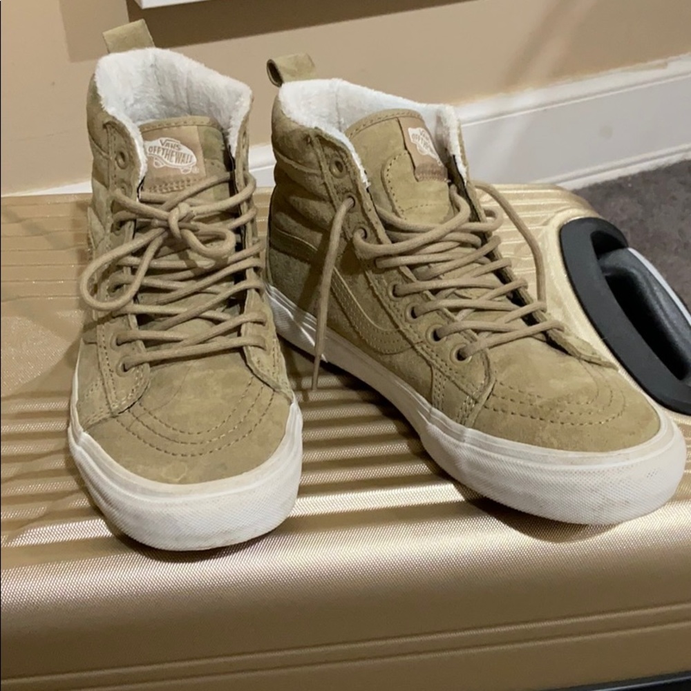 Fur lined tan suede high top Vans